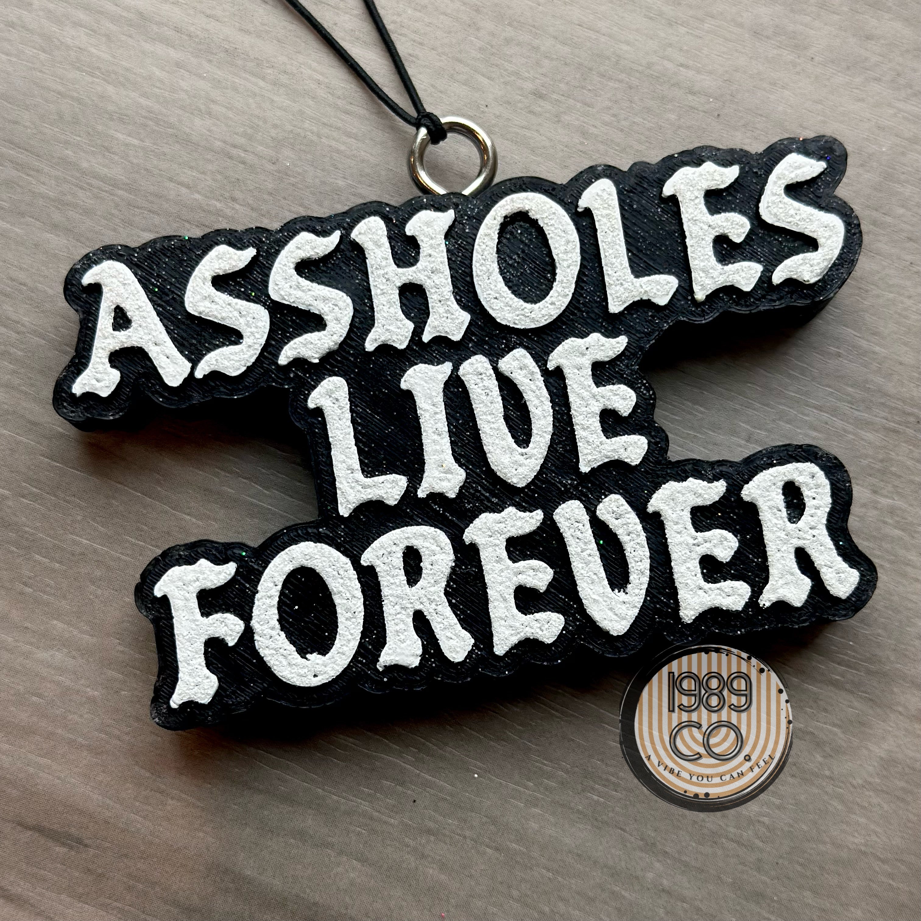 Assholes Live Forever Car Freshie